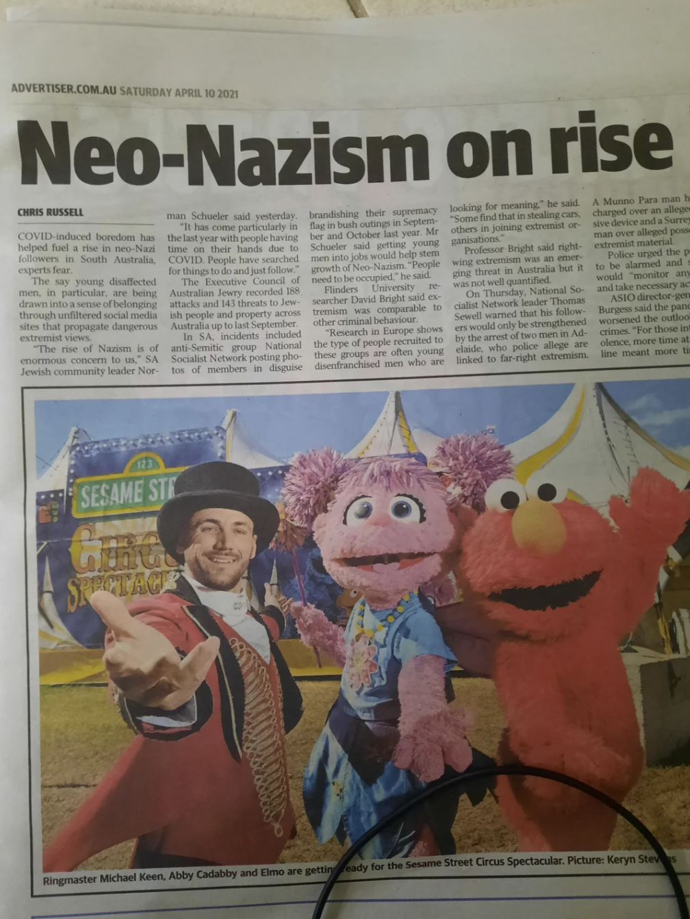 cartoon - Advertiser.Com.Au Saturday Apr 201 NeoNazism on rise th The e A Sesame Ste inger Micht een Ably Cubby ass are g ye besame Street Cross Spectandar Picture Karys S